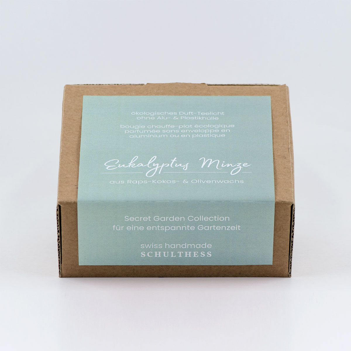 Teelicht_EukalyptusMinze Teelicht mit belebend-frischem Duft nach Eukalyptus und Minze – handgemacht in der Schweiz, mit synthetischem Duft und Baumwolldocht.